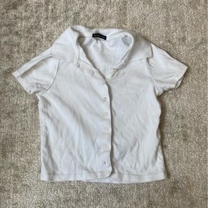 White brandy melville scrolled button collared t-shirt